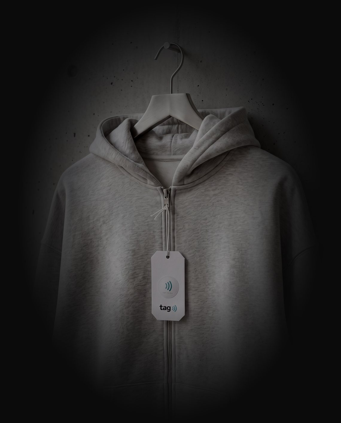 A hoodie on the rack with its TAG hang tag